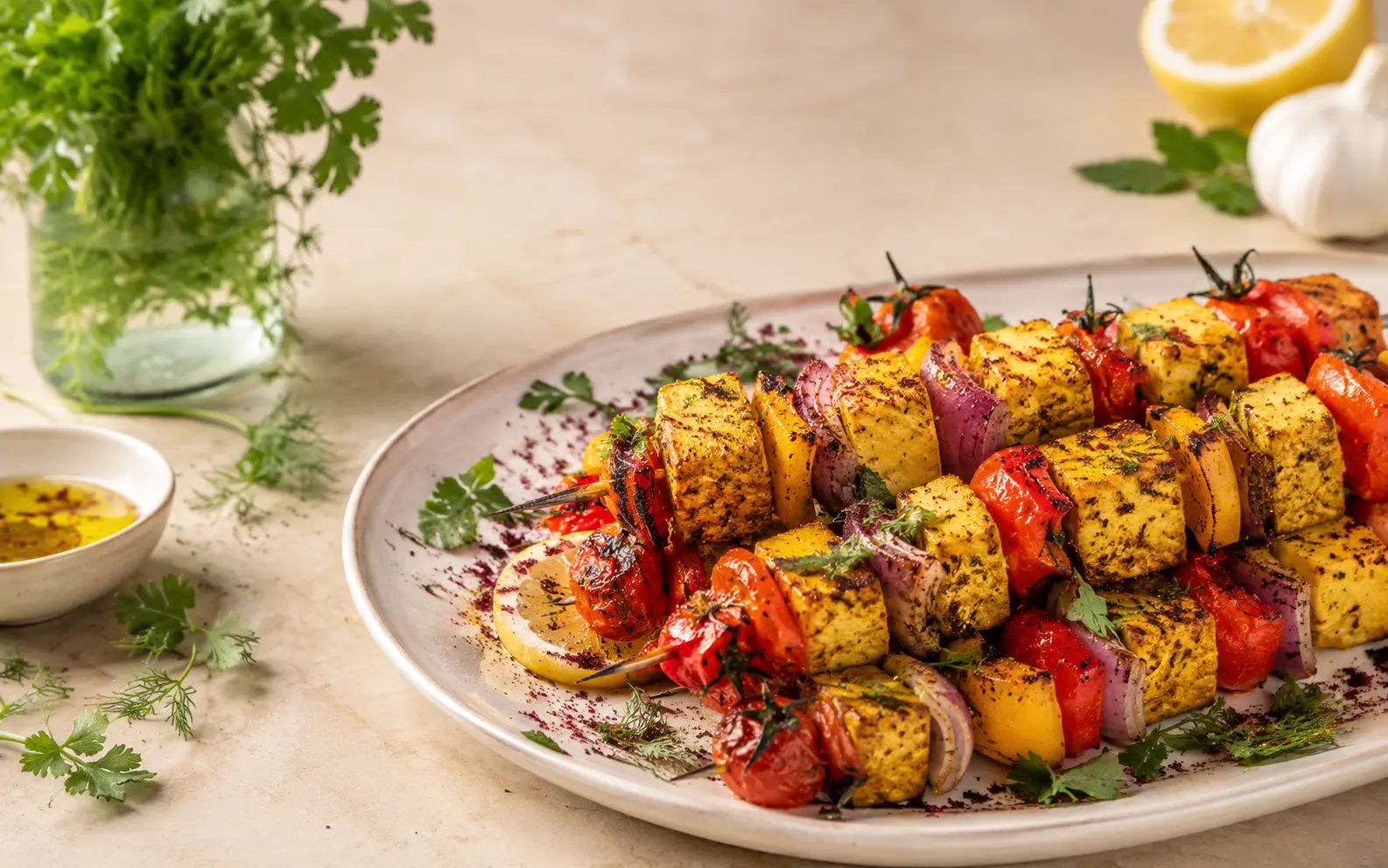 Vegan tofu kebab plate with grilled vegetables